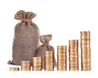 Image of Wealth. Stacks of coins from smaller to bigger and burlap bags isolated on white
