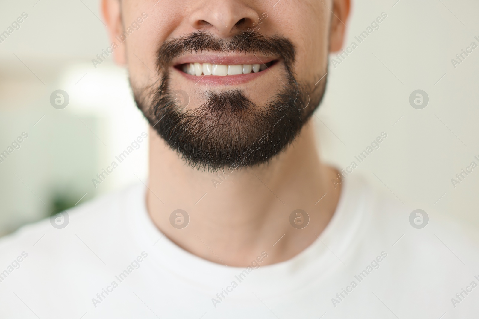 Smiling man before shaving on blurred background, closeup Photo of Smiling man before shaving on blurred background, closeup