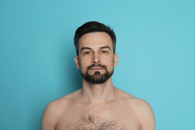 Photo of Handsome man before shaving on light blue background