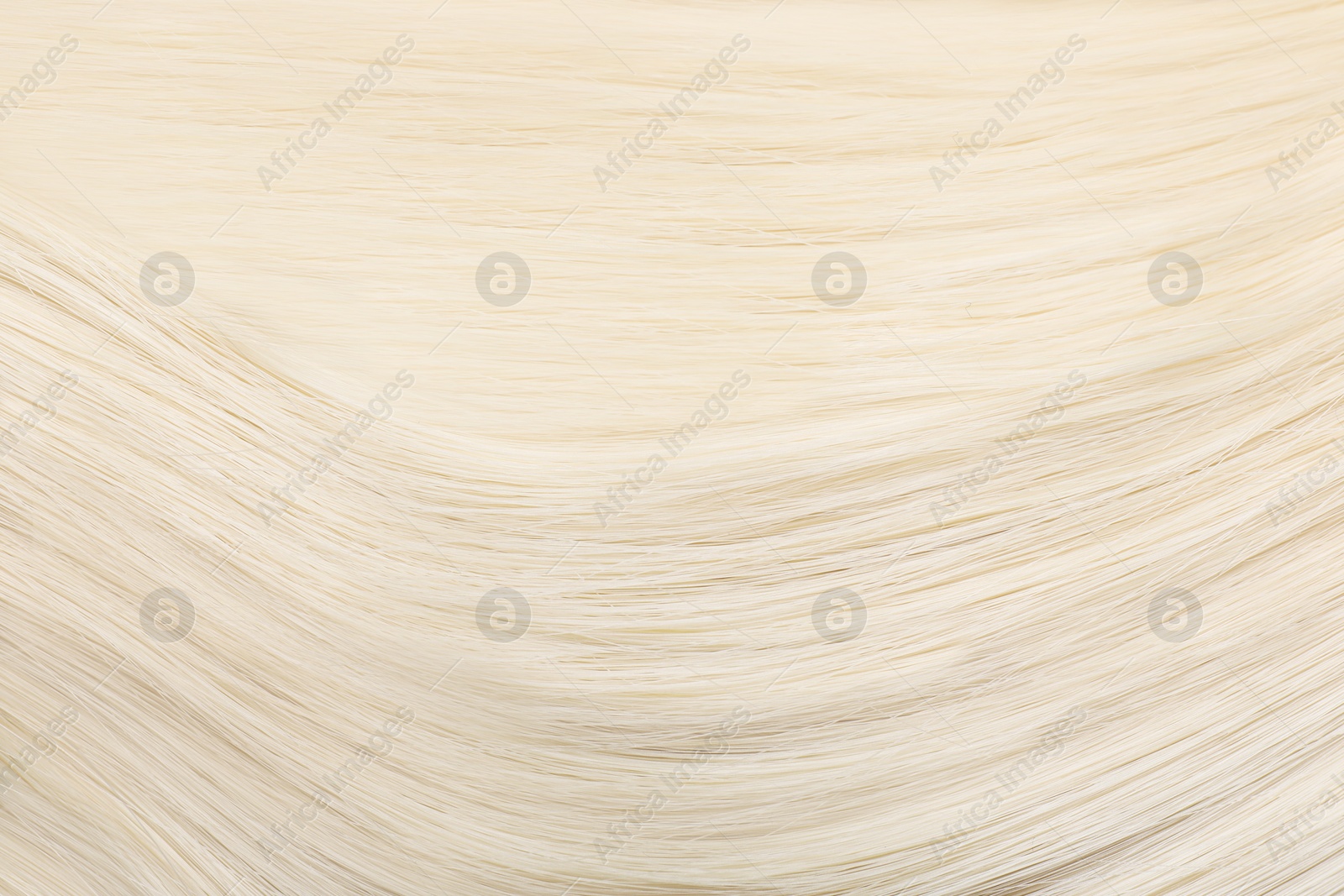 Beautiful shiny blonde straight hair as background, closeup Image of Beautiful shiny blonde straight hair as background, closeup