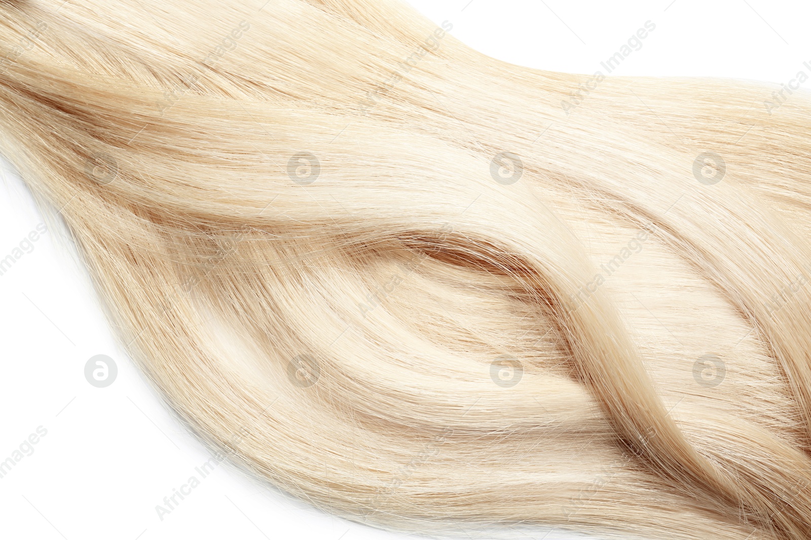 Locks of healthy blond hair on white background Image of Locks of healthy blond hair on white background
