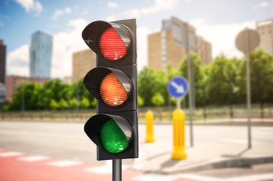 Image of Traffic lights on city street. Signaling device