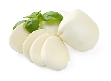 Photo of Pieces of mozzarella cheese and basil isolated on white