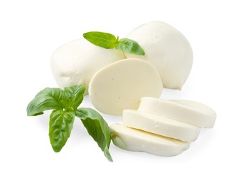 Photo of Pieces of mozzarella cheese and basil isolated on white