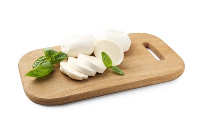 Photo of Pieces of mozzarella cheese and basil isolated on white
