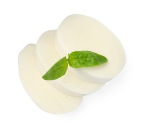 Photo of Pieces of mozzarella cheese and basil isolated on white, top view