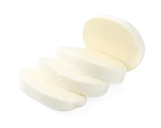 Photo of Pieces of mozzarella cheese isolated on white