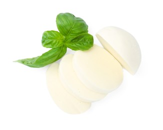 Photo of Pieces of mozzarella cheese and basil isolated on white, top view