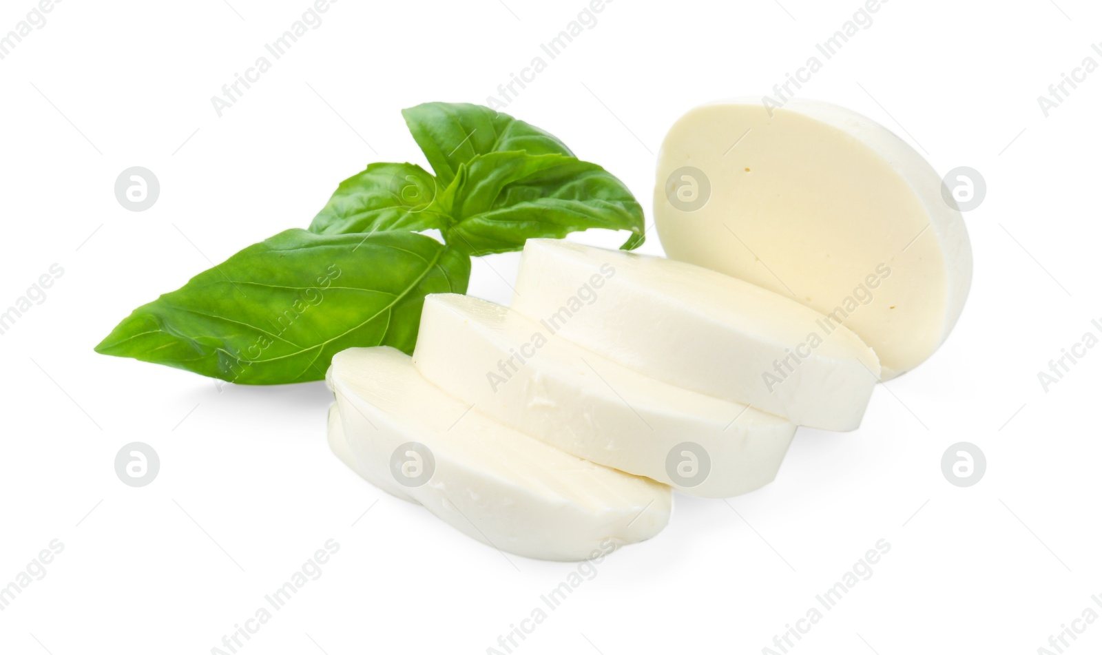 Pieces of mozzarella cheese and basil isolated on white Photo of Pieces of mozzarella cheese and basil isolated on white