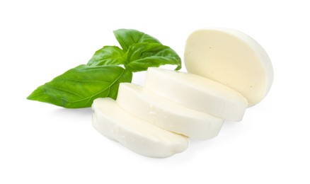 Photo of Pieces of mozzarella cheese and basil isolated on white