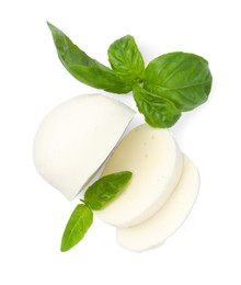 Photo of Pieces of mozzarella cheese and basil isolated on white, top view
