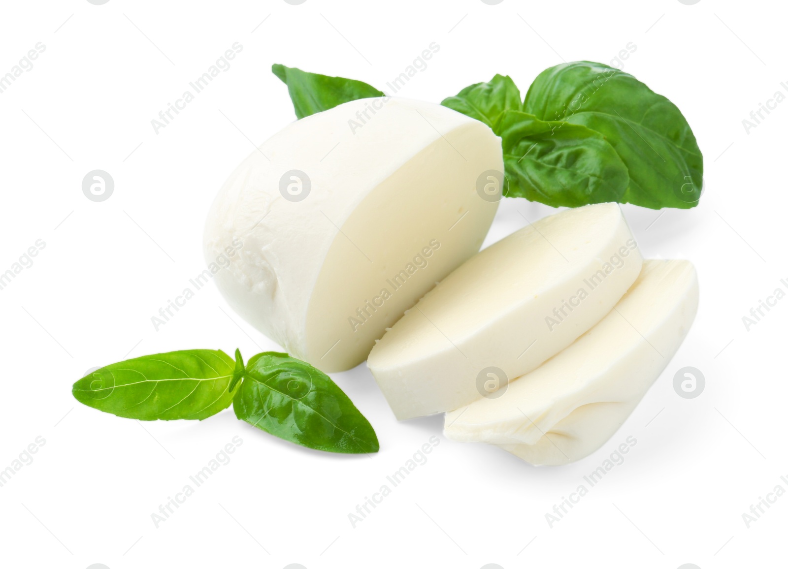 Pieces of mozzarella cheese and basil isolated on white Photo of Pieces of mozzarella cheese and basil isolated on white