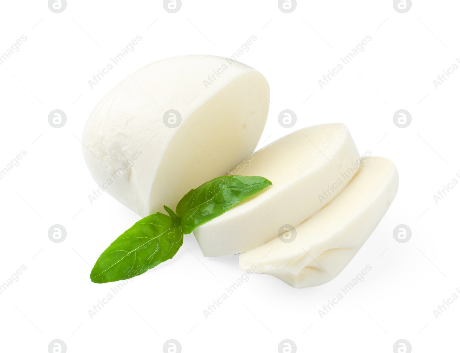 Pieces of mozzarella cheese and basil isolated on white Photo of Pieces of mozzarella cheese and basil isolated on white