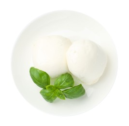 Photo of Tasty mozzarella cheese and basil isolated on white, top view