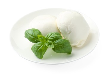 Photo of Tasty mozzarella cheese and basil isolated on white