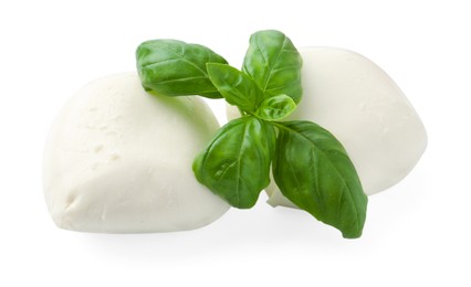 Photo of Tasty mozzarella cheese and basil isolated on white