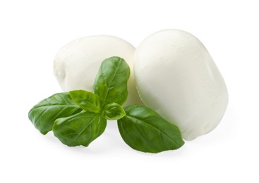 Photo of Tasty mozzarella cheese and basil isolated on white