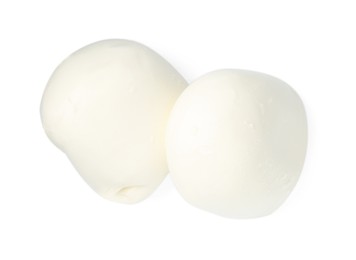 Photo of Tasty mozzarella cheese balls isolated on white, top view