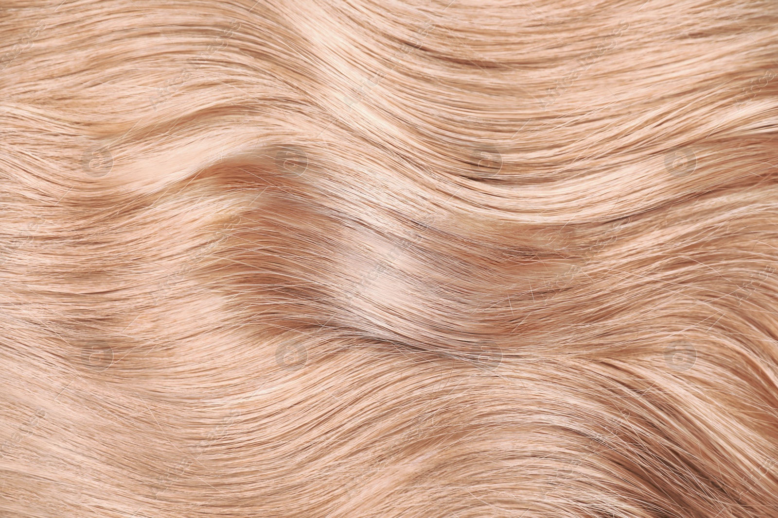 Beautiful shiny blonde hair as background, top view Image of Beautiful shiny blonde hair as background, top view