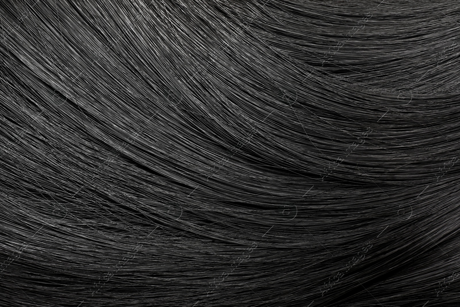Image of Beautiful shiny black hair as background, top view