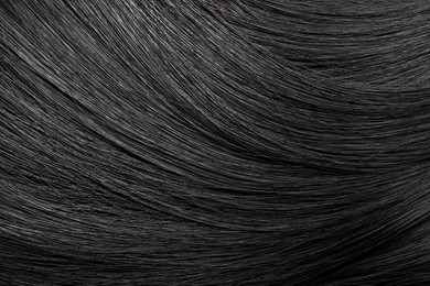 Image of Beautiful shiny black hair as background, top view
