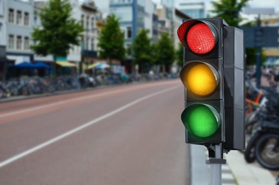 Image of Traffic lights on city street. Signaling device