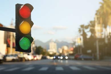 Image of Traffic lights on city road. Signaling device