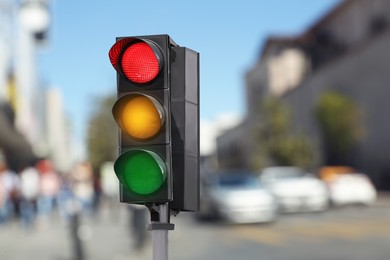 Image of Traffic lights on city road. Signaling device