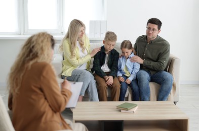 Photo of Family having consultation with psychologist in office