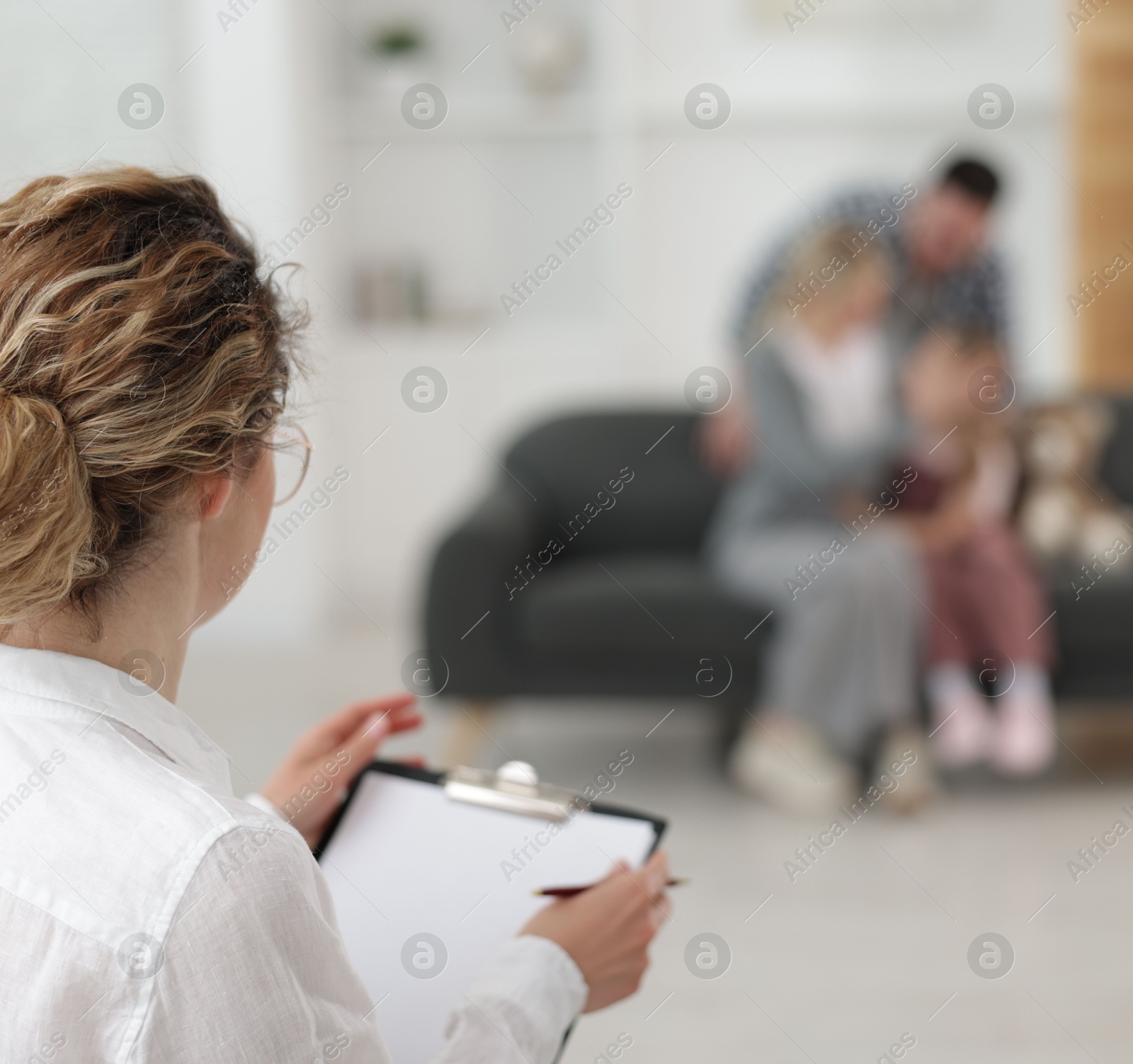 Family psychologist during consultation in office, selective focus Photo of Family psychologist during consultation in office, selective focus