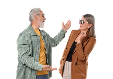 Photo of Senior couple in stylish outfits on white background