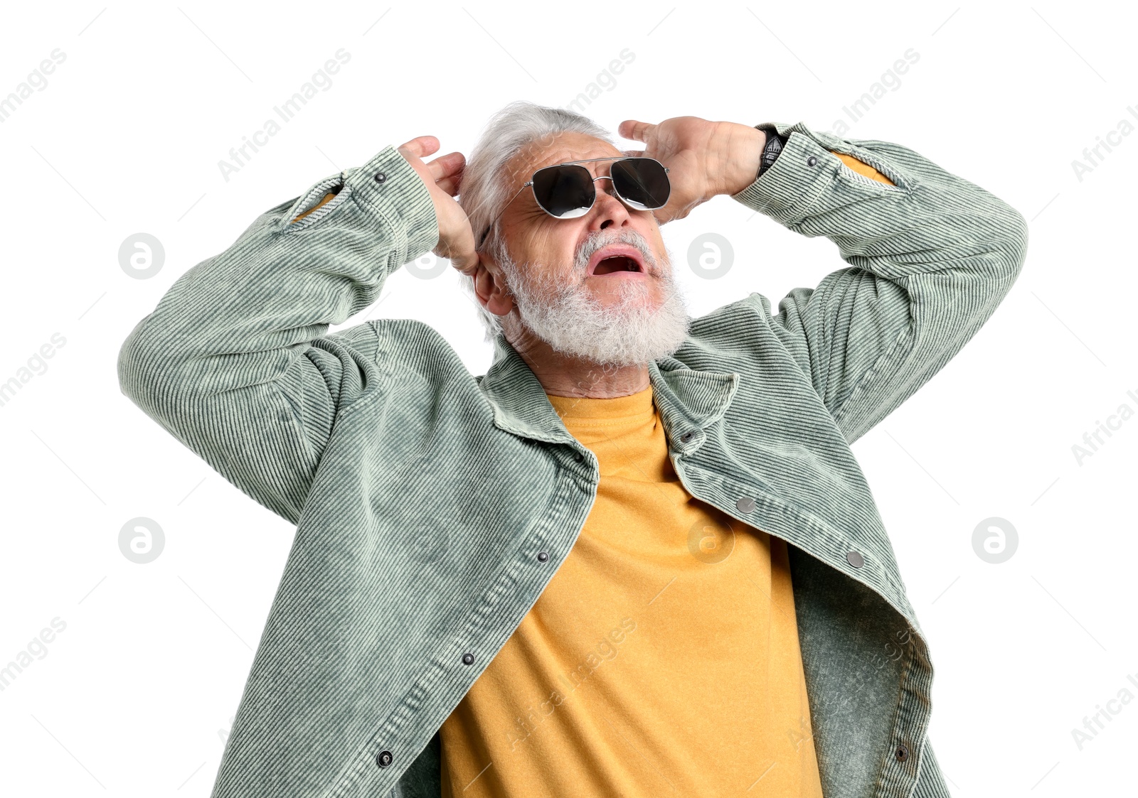Elderly man in stylish outfit on white background Photo of Elderly man in stylish outfit on white background