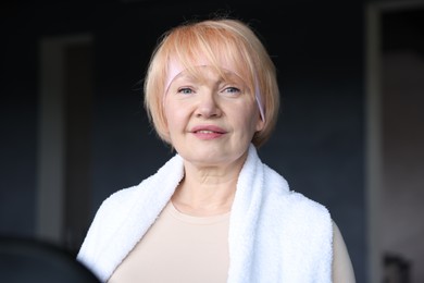Photo of Portrait of beautiful senior woman in gym
