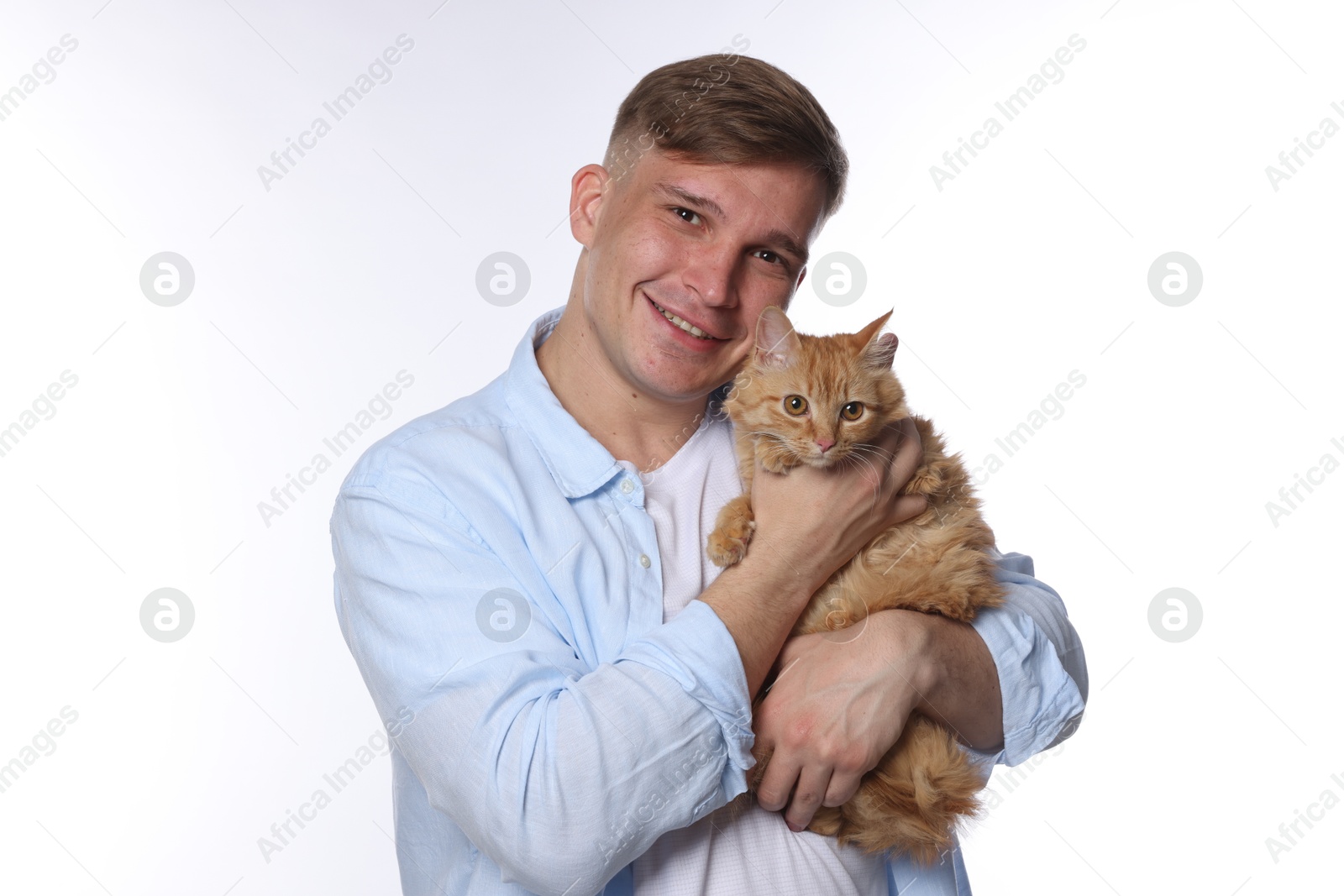 Man with cute ginger cat on white background Photo of Man with cute ginger cat on white background