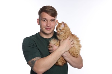 Photo of Man with cute ginger cat on white background
