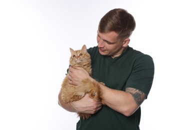 Photo of Man with cute ginger cat on white background