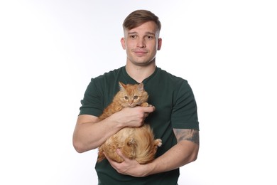Photo of Man with cute ginger cat on white background