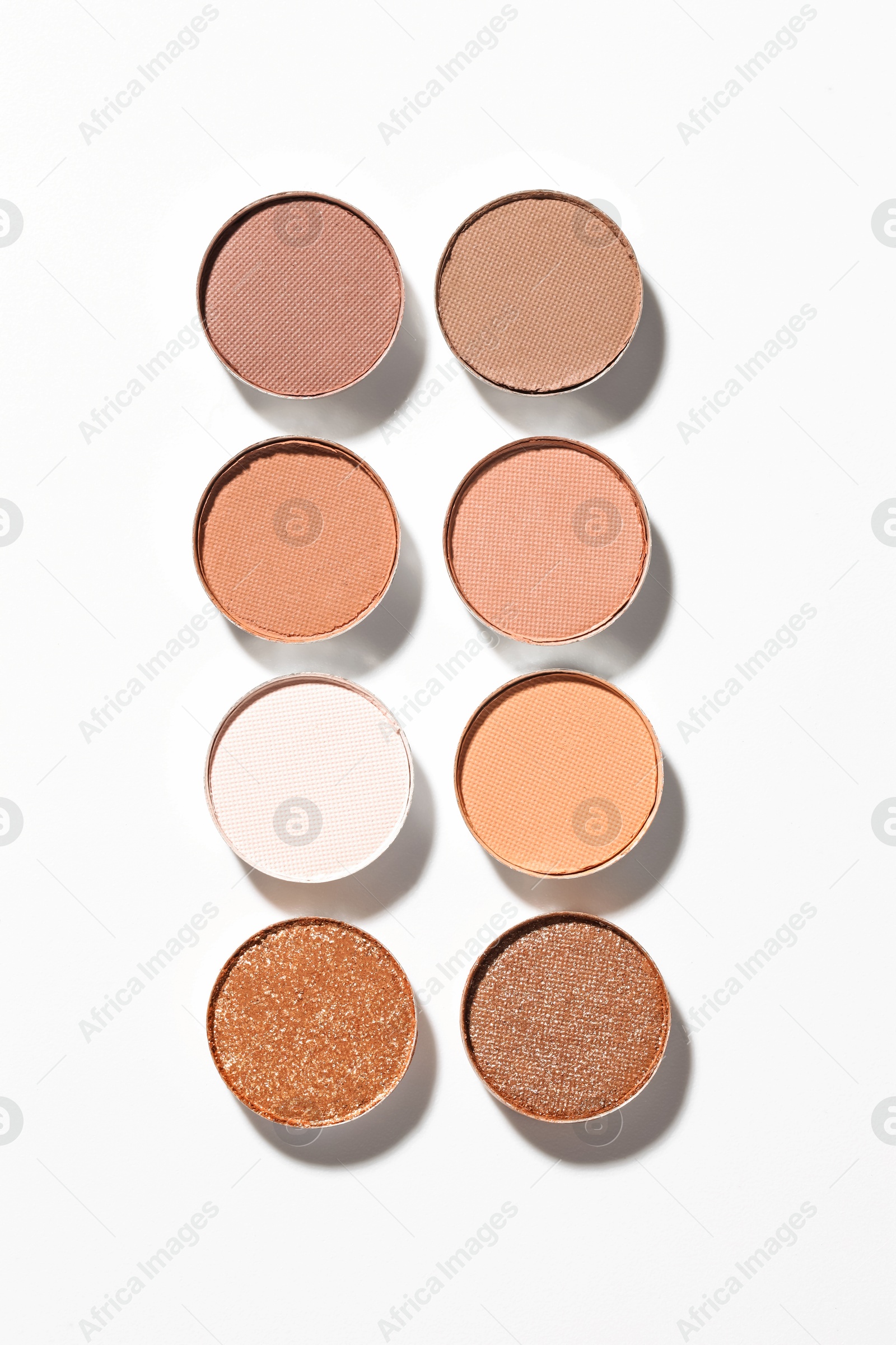 Beautiful eyeshadow refill pans on white background, flat lay Photo of Beautiful eyeshadow refill pans on white background, flat lay