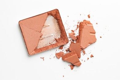 Photo of Broken eyeshadow refill pan on white background, top view