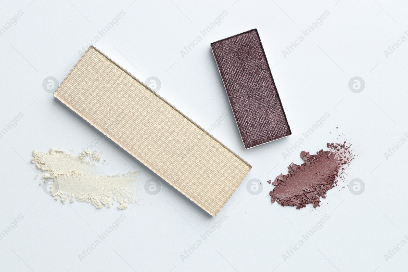 Beautiful eyeshadow refill pans on white background, flat lay Photo of Beautiful eyeshadow refill pans on white background, flat lay