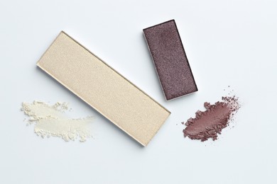 Photo of Beautiful eyeshadow refill pans on white background, flat lay