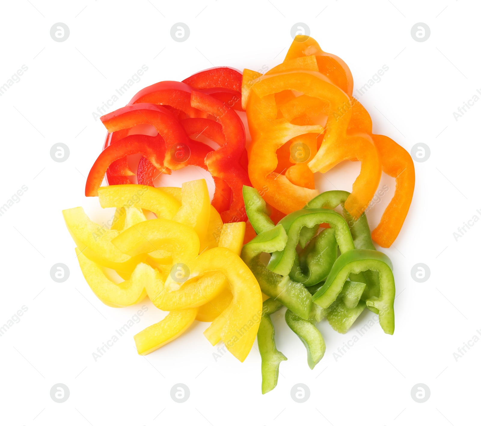 Slices of fresh colorful bell peppers isolated on white, above view Photo of Slices of fresh colorful bell peppers isolated on white, above view