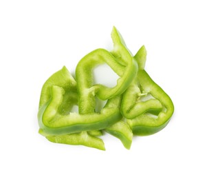Photo of Slices of fresh green bell peppers isolated on white, above view