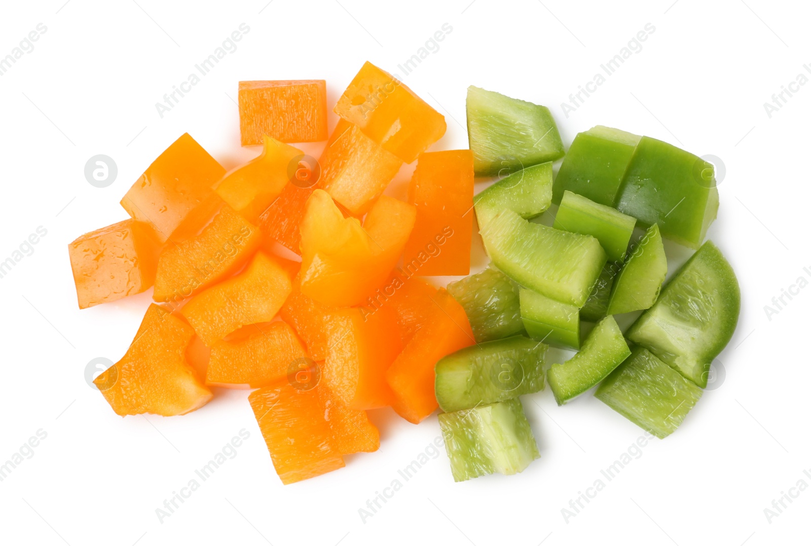 Pieces of fresh colorful bell peppers isolated on white, top view Photo of Pieces of fresh colorful bell peppers isolated on white, top view