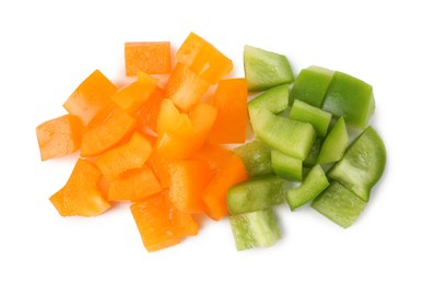 Photo of Pieces of fresh colorful bell peppers isolated on white, top view