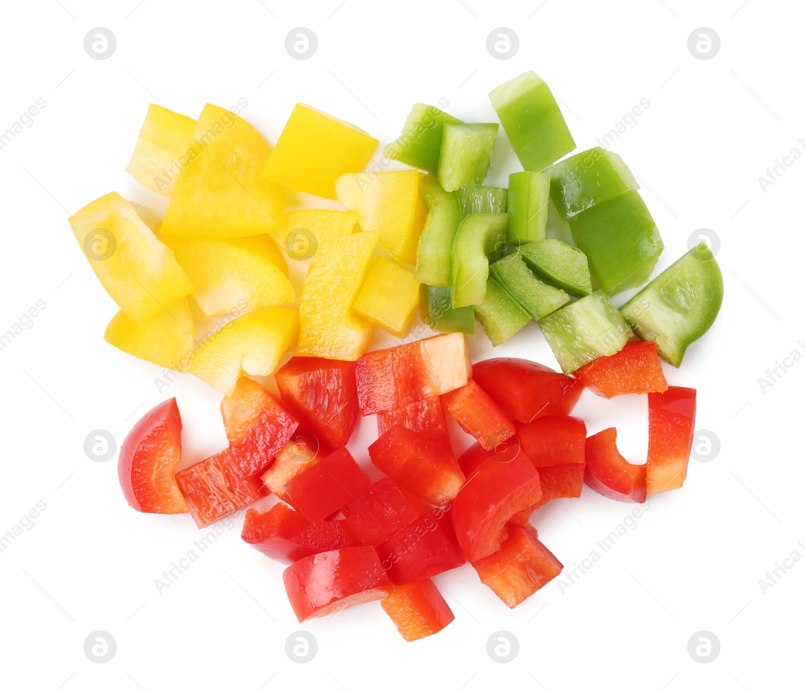Pieces of fresh colorful bell peppers isolated on white, top view Photo of Pieces of fresh colorful bell peppers isolated on white, top view
