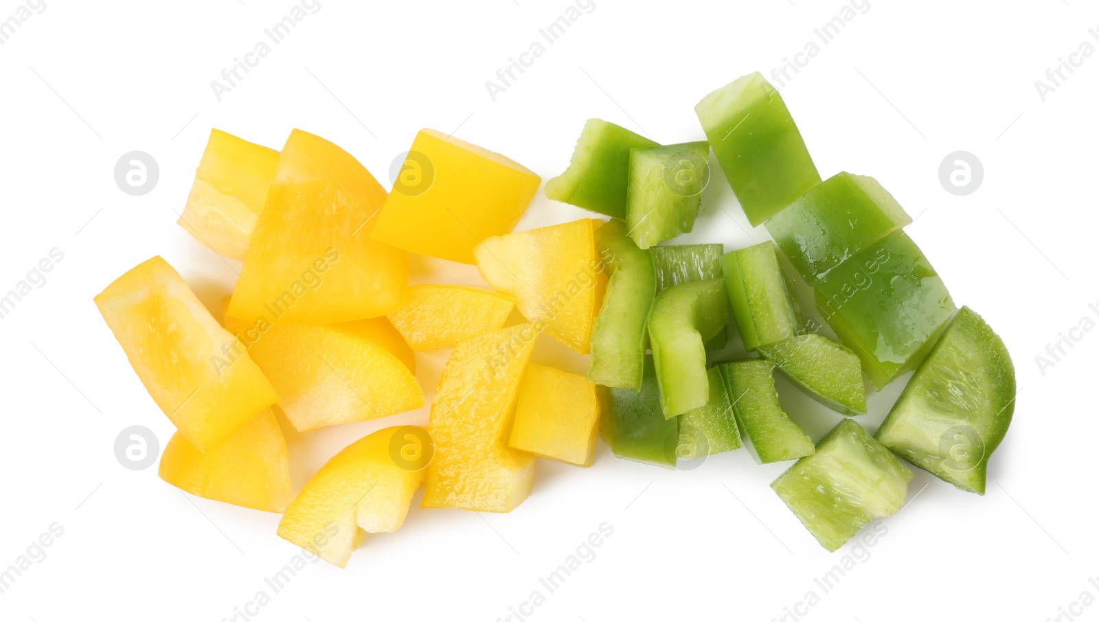 Pieces of fresh colorful bell peppers isolated on white, top view Photo of Pieces of fresh colorful bell peppers isolated on white, top view