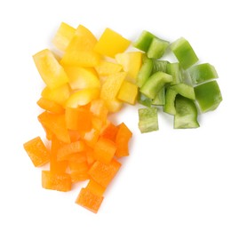 Photo of Pieces of fresh colorful bell peppers isolated on white, top view