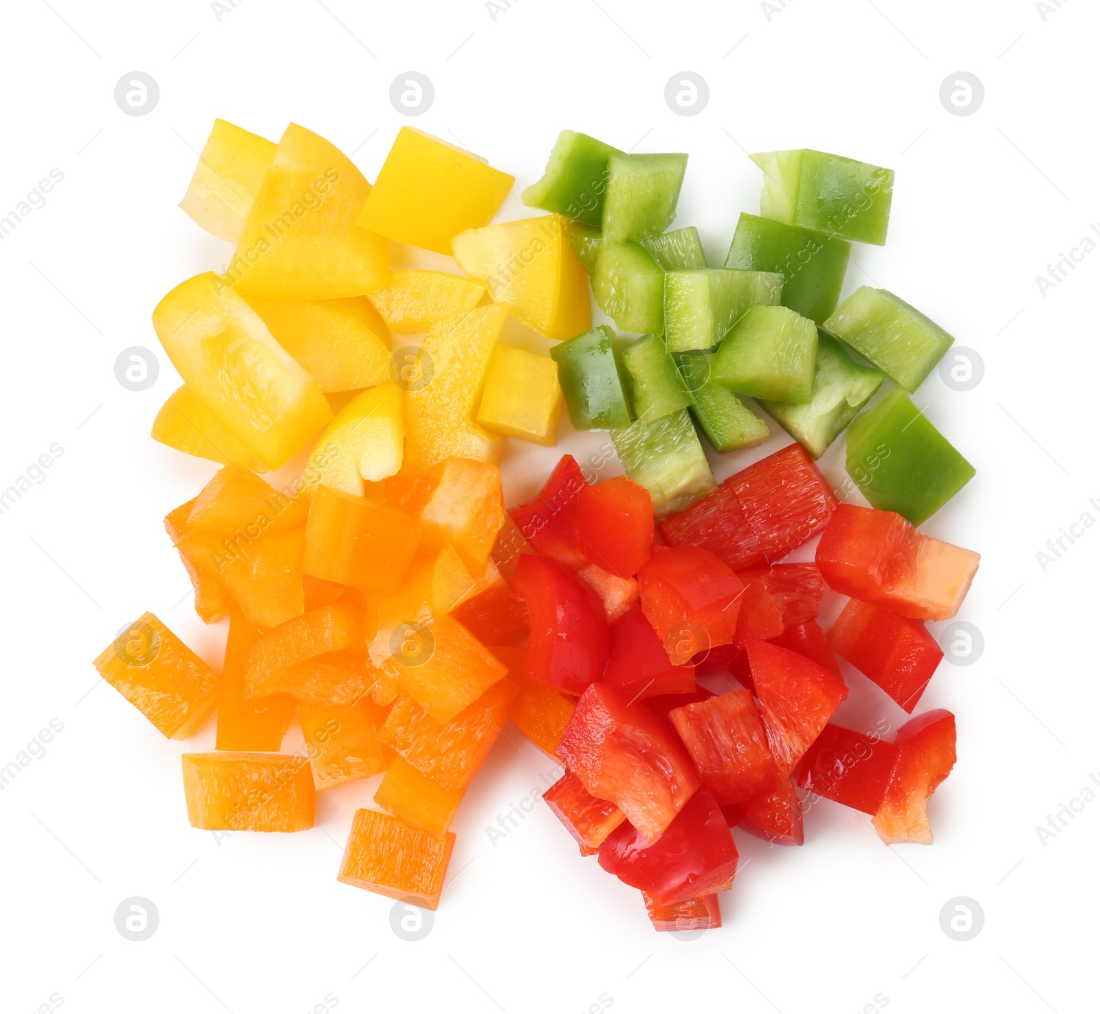 Pieces of fresh colorful bell peppers isolated on white, top view Photo of Pieces of fresh colorful bell peppers isolated on white, top view