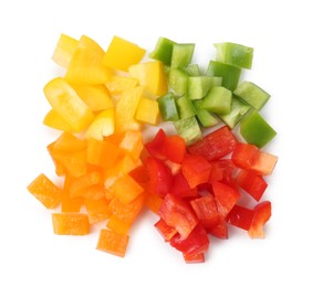 Photo of Pieces of fresh colorful bell peppers isolated on white, top view